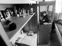 With his locker open, Joe Cosby, marines, receives a text message from his brother informing him that he has been diagnosed with leukemia.  Joe is one of the residetns of the Veterans Transition House currently housed at the rectory of the now closed St. John church on County Street in New Bedford, MA. A new building is scheduled to be constructed in 2019.  PHOTO PETER PEREIRA